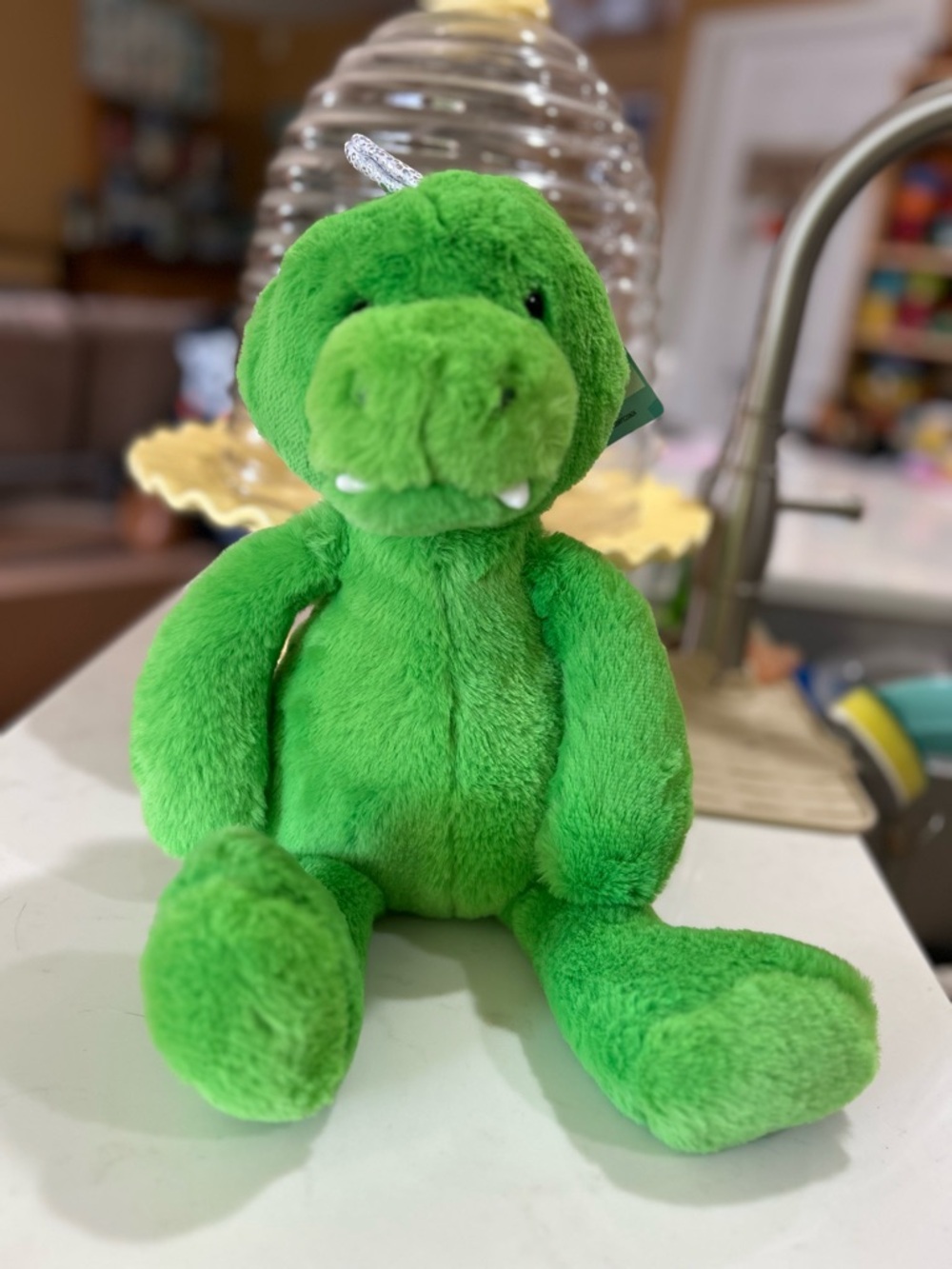Green plush dinosaur